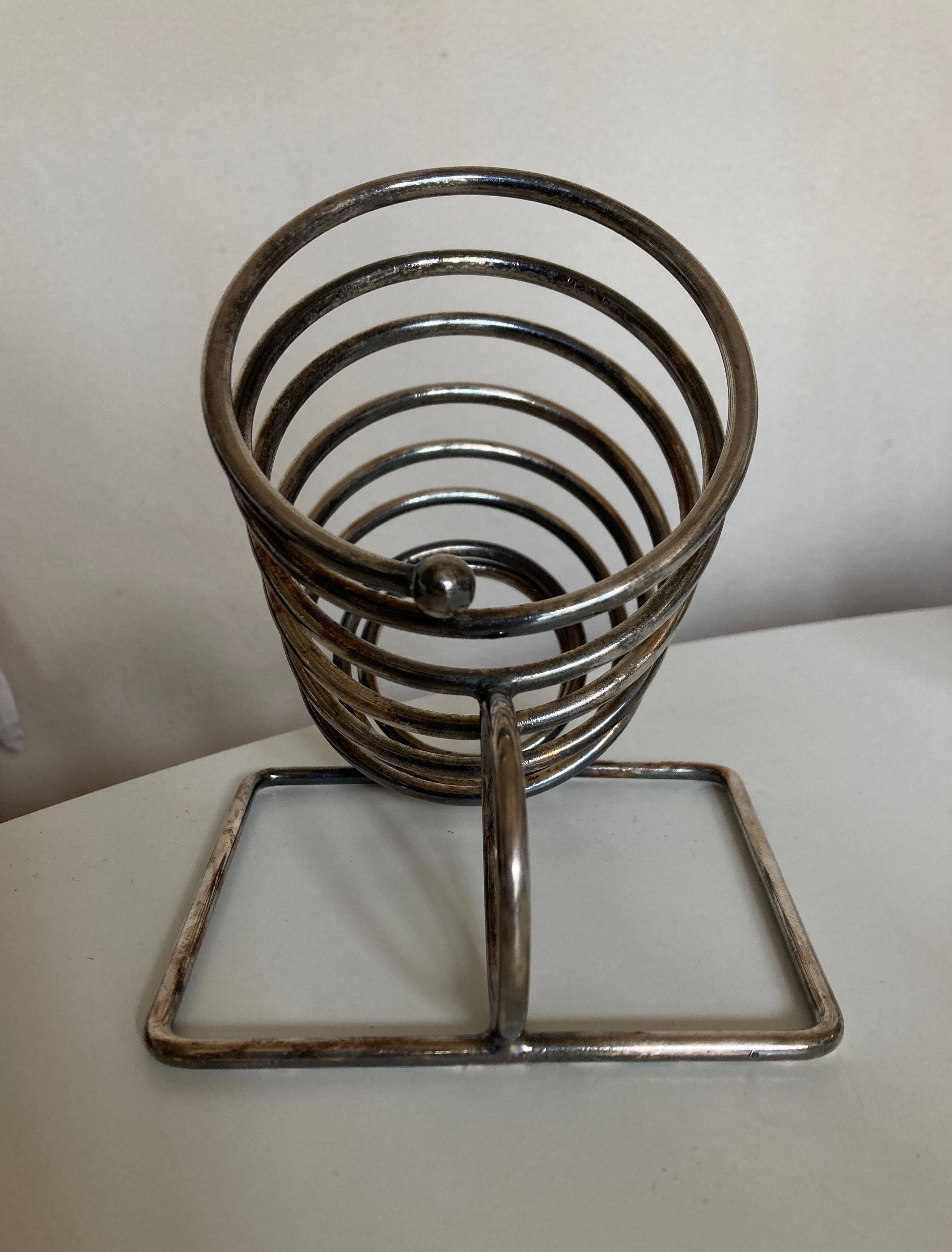 Spring bottle holder in silver metal 1970