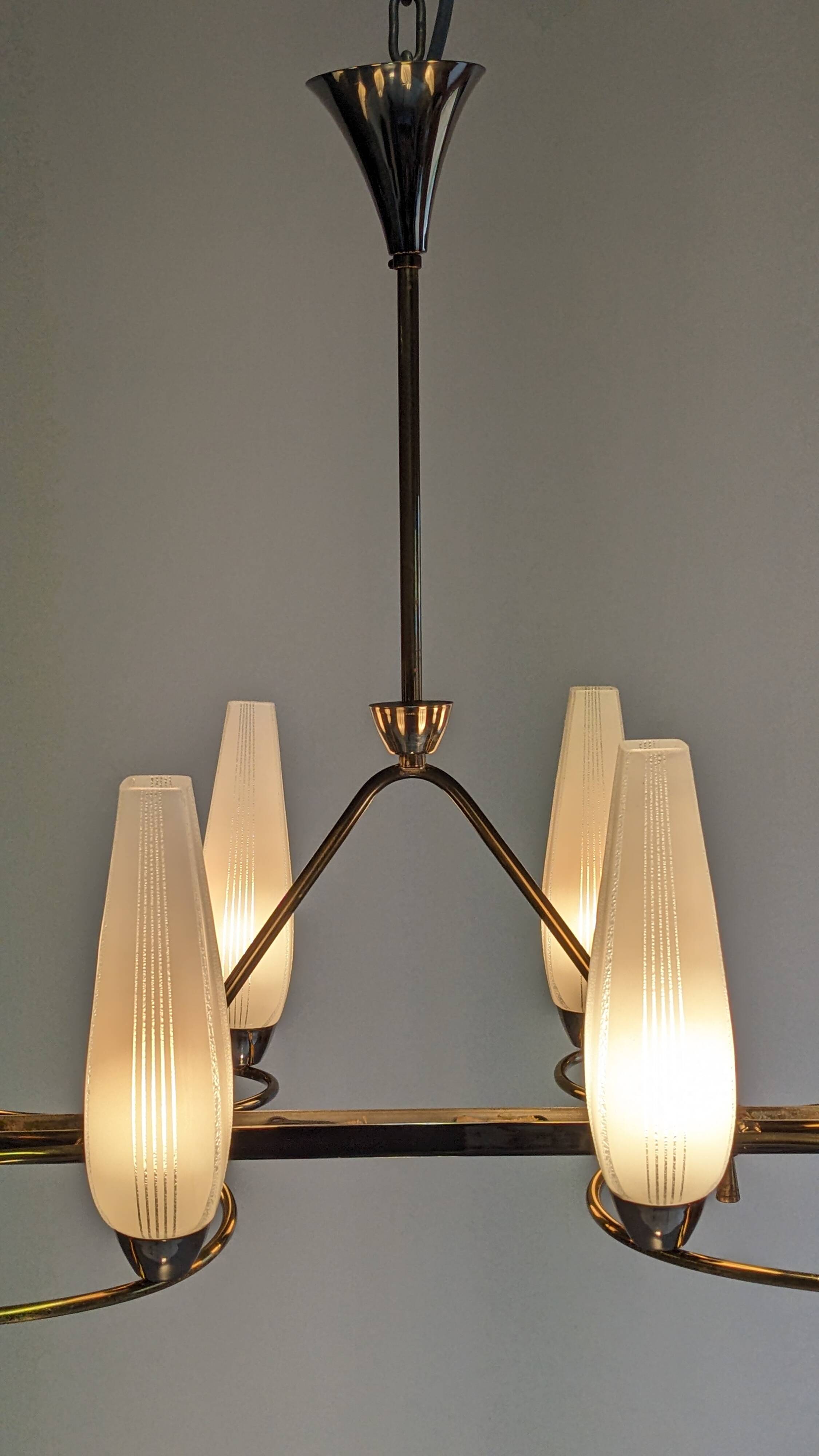 Eight-light chandelier in glass and brass, France circa 1960.