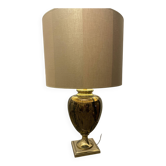 Bronze table lamp with a gold shade.