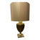 Bronze table lamp with a golden shade.