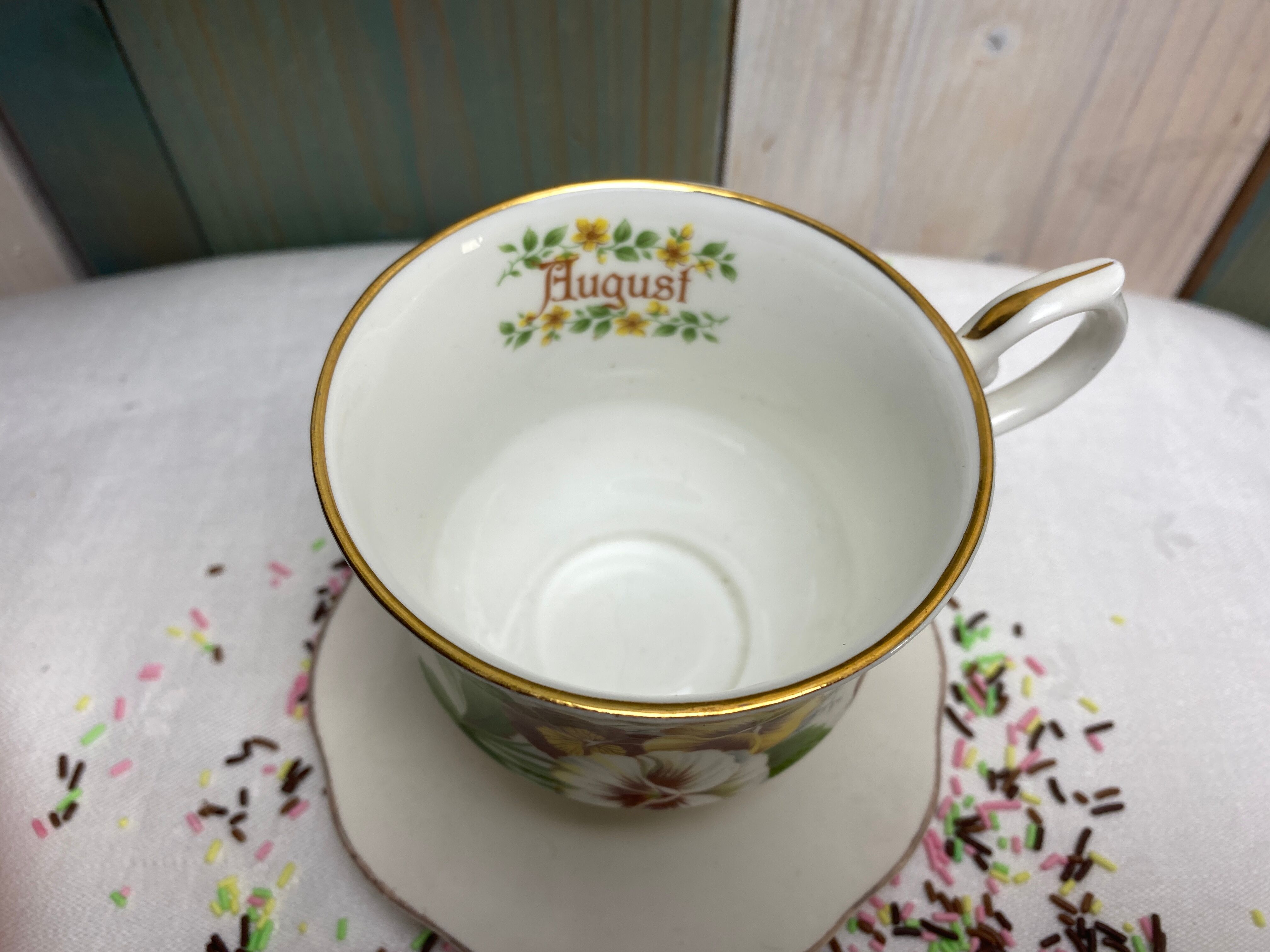 Antique porcelain cup and sub-cup