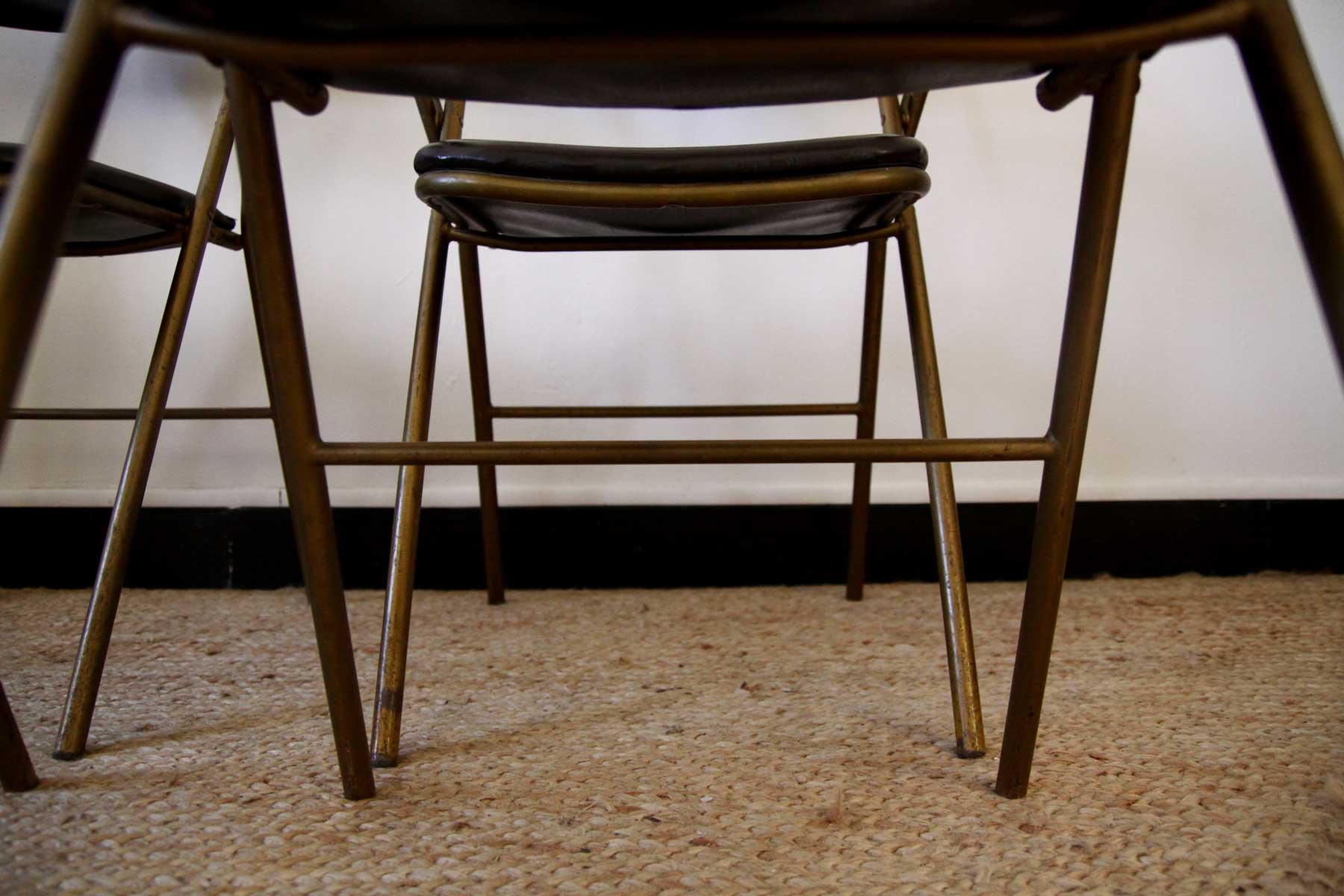 Lot of 4 metal and skai folding chairs