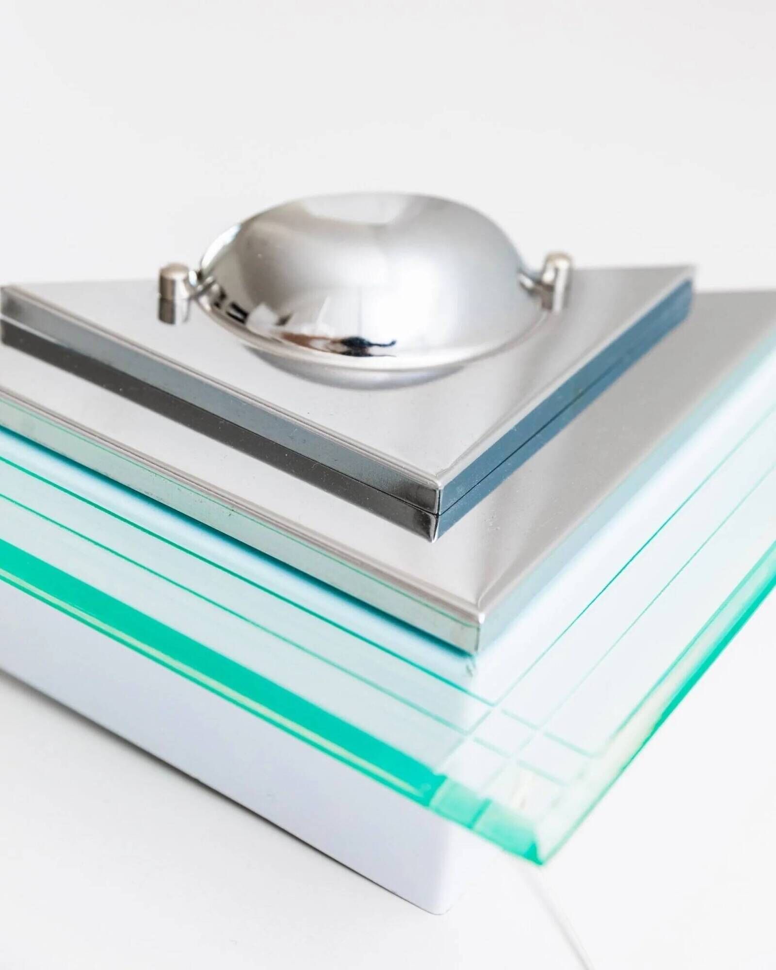 Muted green glass wall lamp with chrome metal accents, Memphis-style postmodern, 1990s