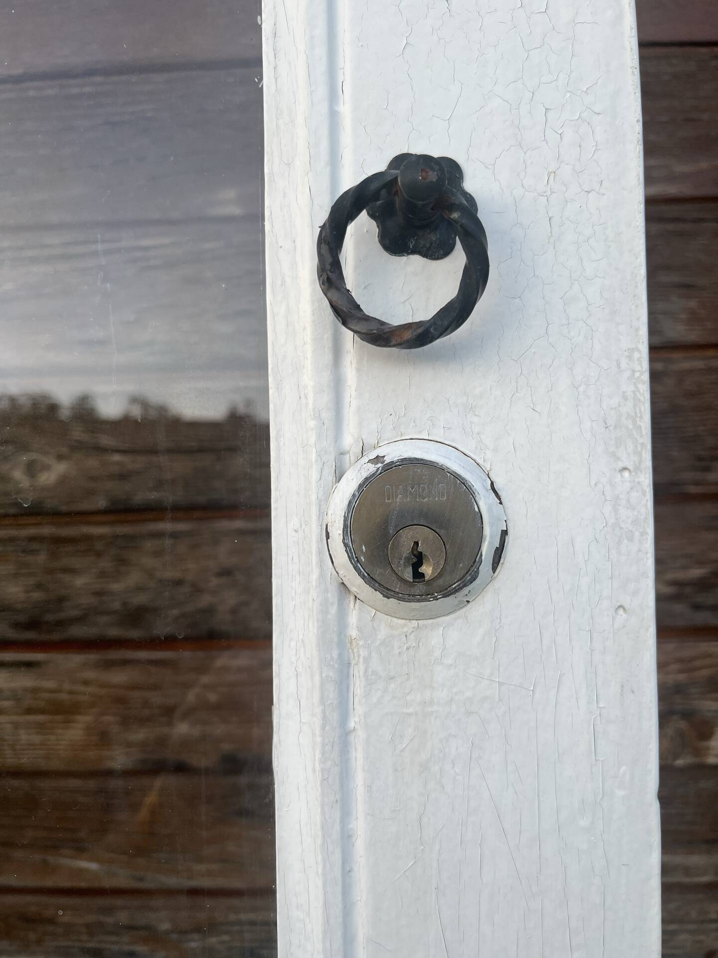 Porte d'entrée ancienne semi-vitrée en bois