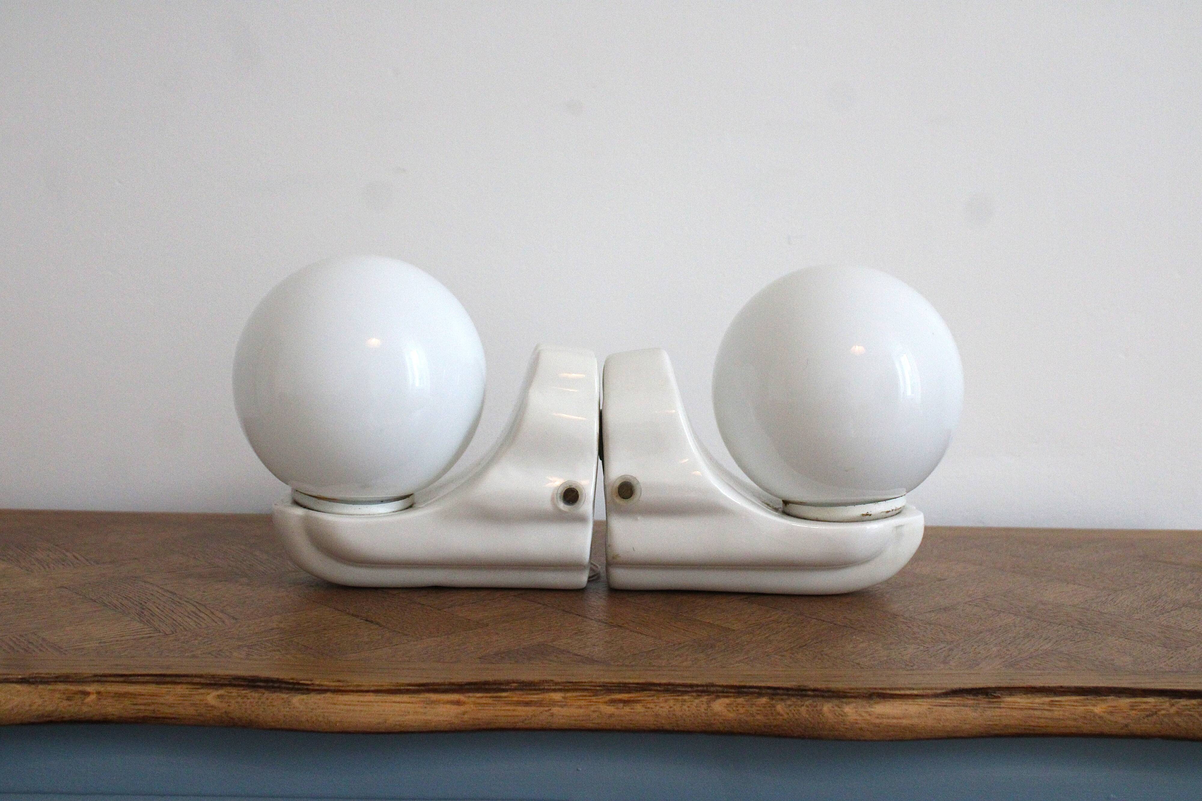 Pair of white ceramic wall lights, Bauhaus style, Italy