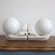 Pair of white ceramic wall lights, Bauhaus style, Italy