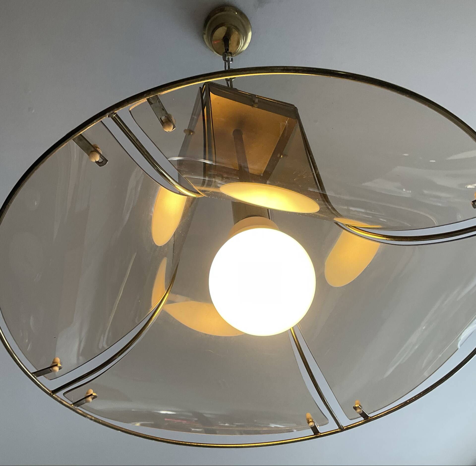Italian suspension lamp in smoked glass and brass from the 1970s.