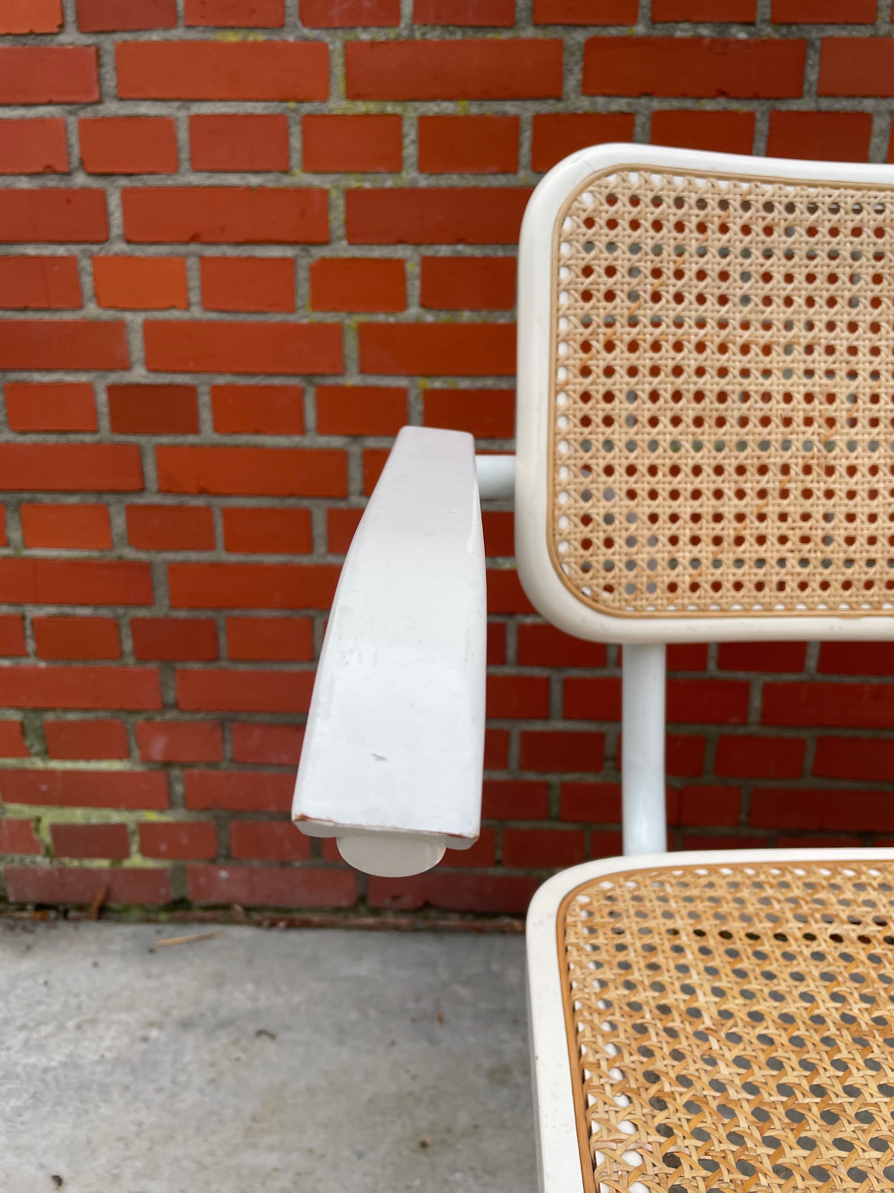 Cesca chair model with armrest in white