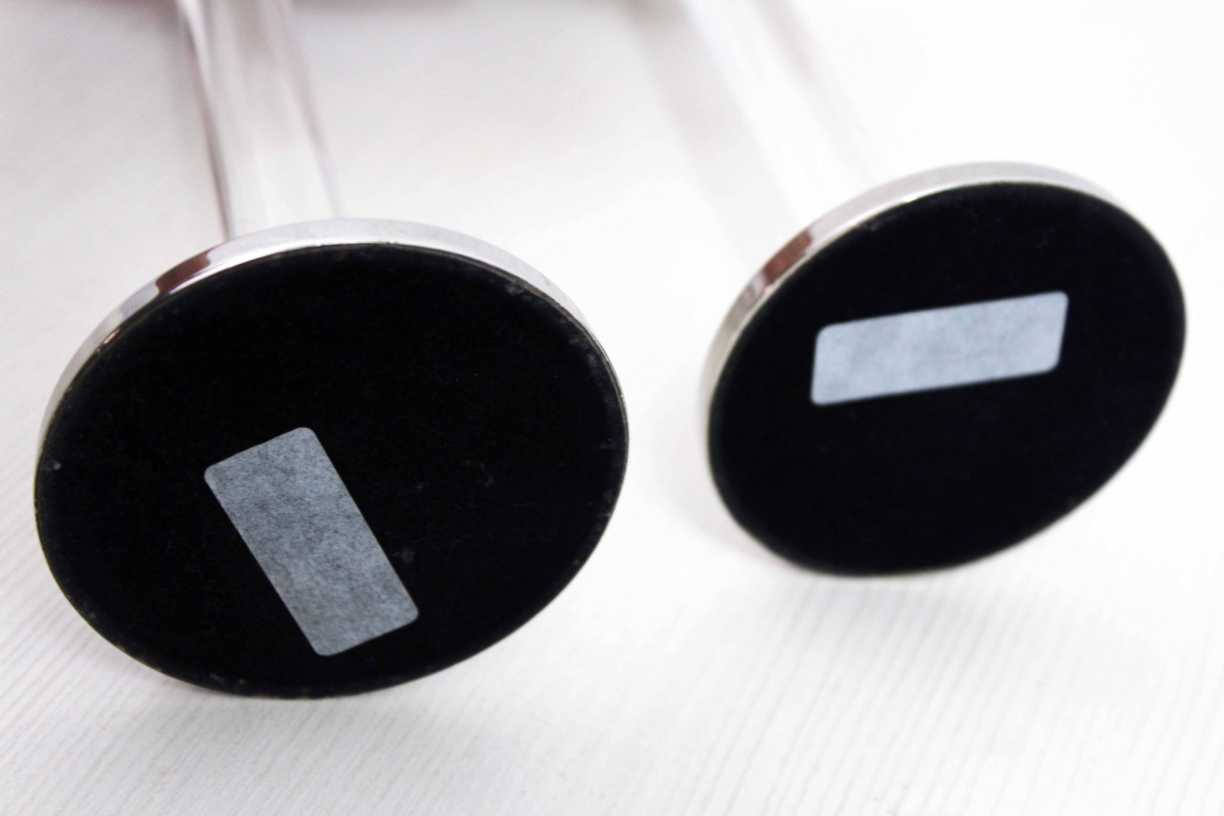 Pair of lucite and silver-plated metal candlesticks