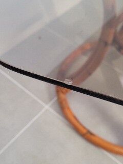 Rattan table and smoked glass