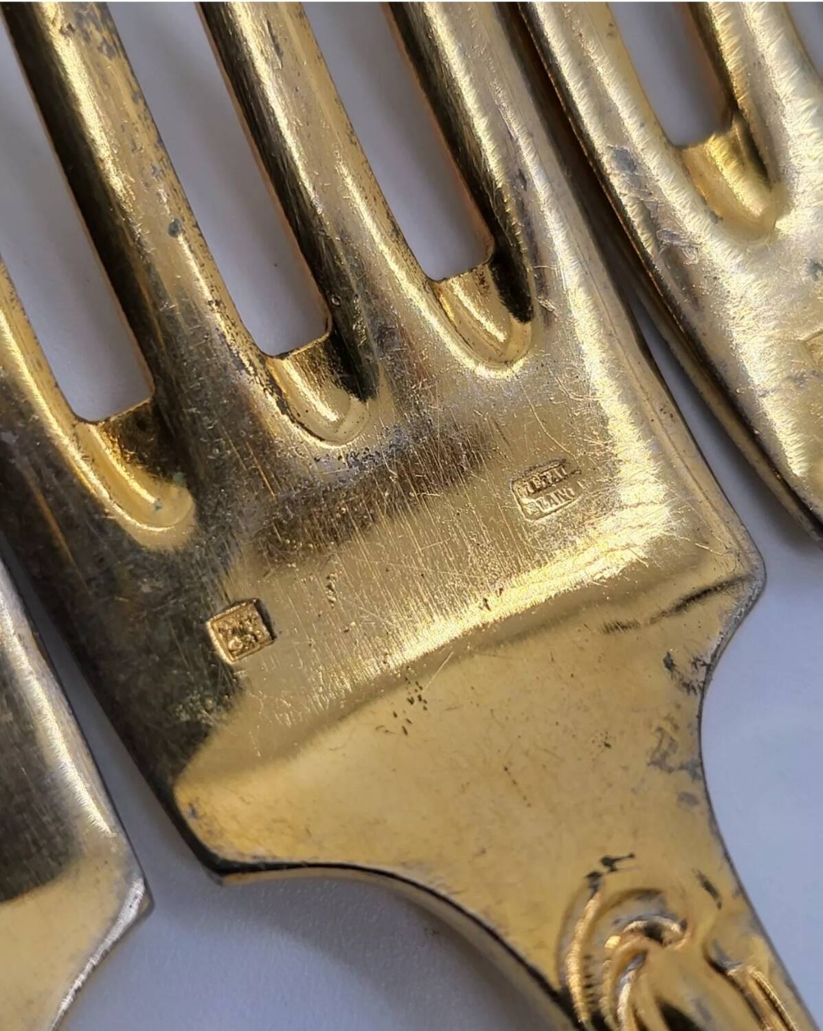 12 Table Forks in gold metal