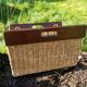 Logs holder in rush and wooden handle