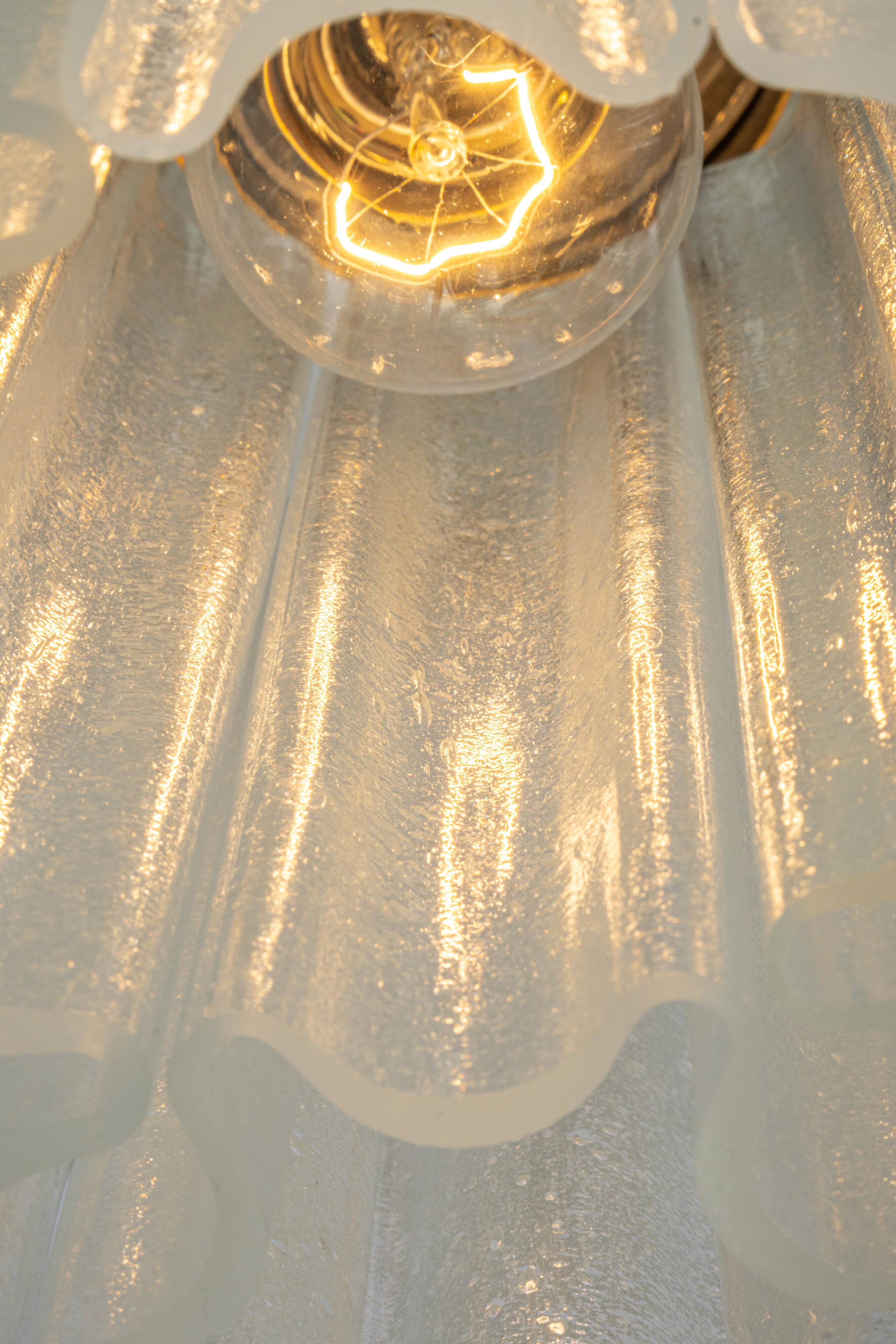 Pendant light with hand-blown glass pieces on a brass base made by Glashütte Limburg.