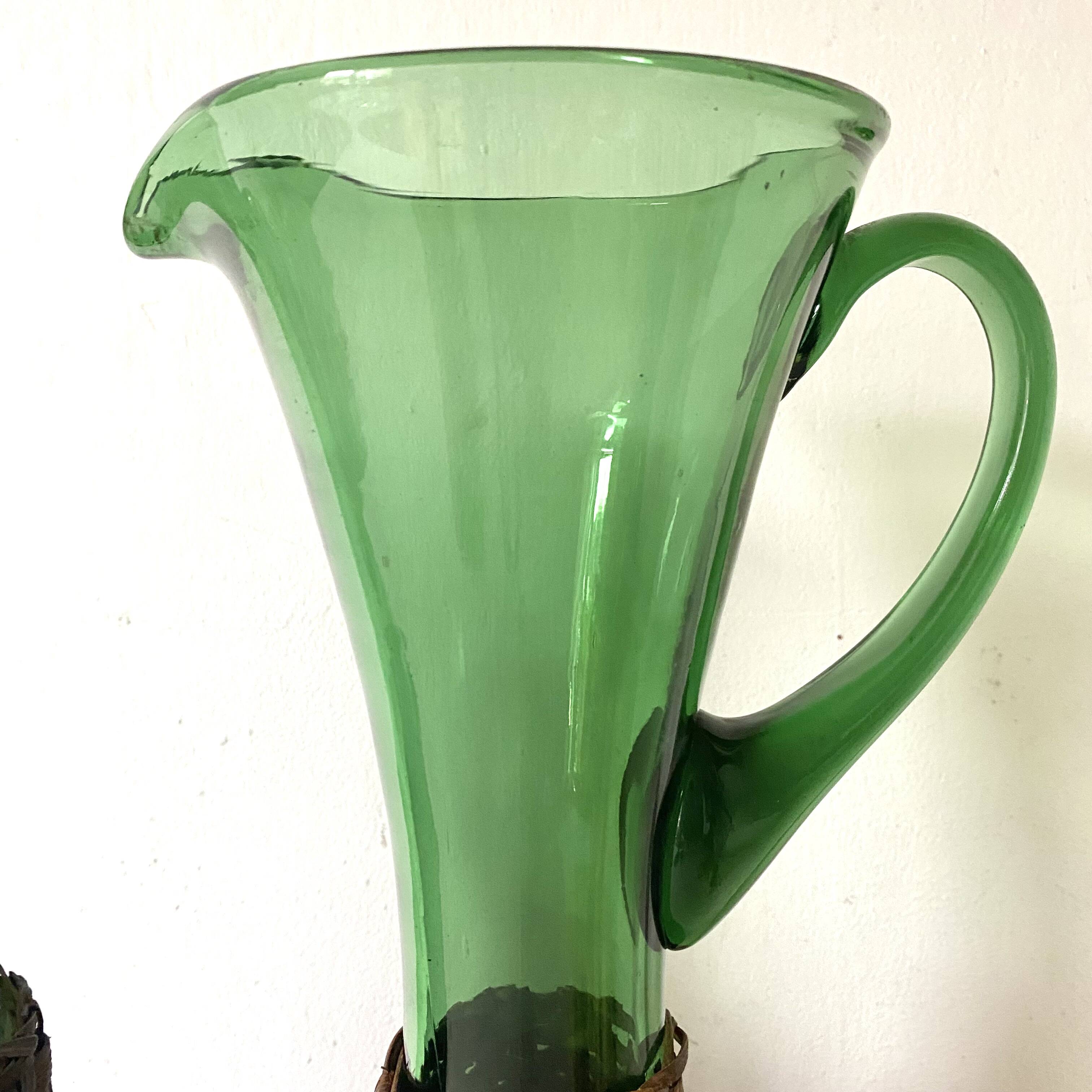 Pitcher and bottle in tinted glass and rattan, Italy, 1960s/1970s