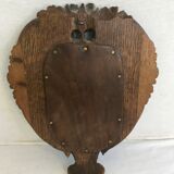 Ancient mirror in carved wood, vintage decoration