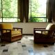 Antique Art Deco cubic-shaped armchairs in walnut and velvet, Germany, 1920s, set of 2