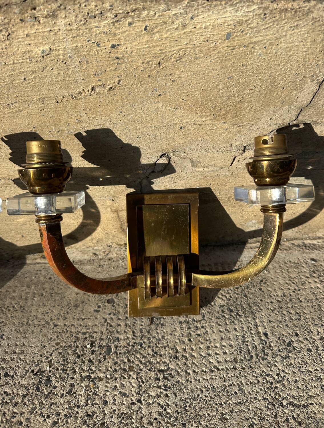 Antique Art Deco wall sconces attributed to Jacques Adnet.