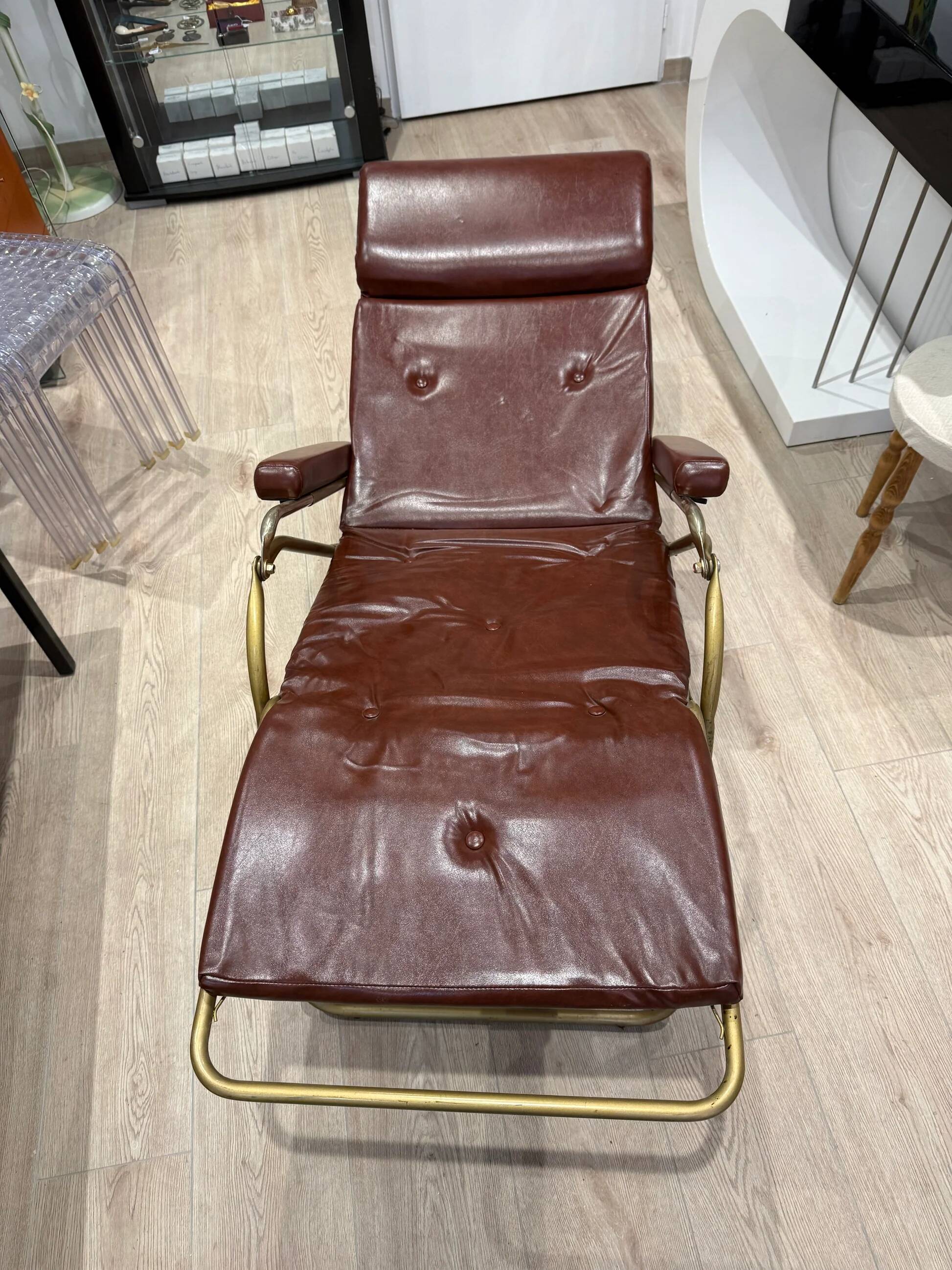 Reclining armchair in brown leather with tubular frame – Italy – 1960s/1970s