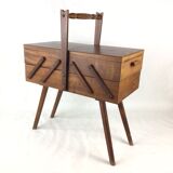 Worker on wooden compass feet