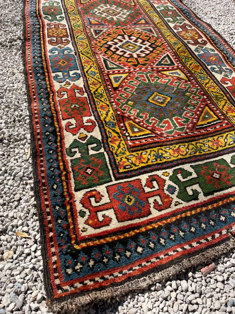 Long antique Persian carpet