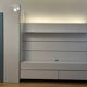 Low furniture, paneling and two-column Globo composition by Roche Bobois.