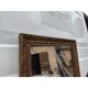 19th-century fireplace mirror in gilded wood and stucco.
