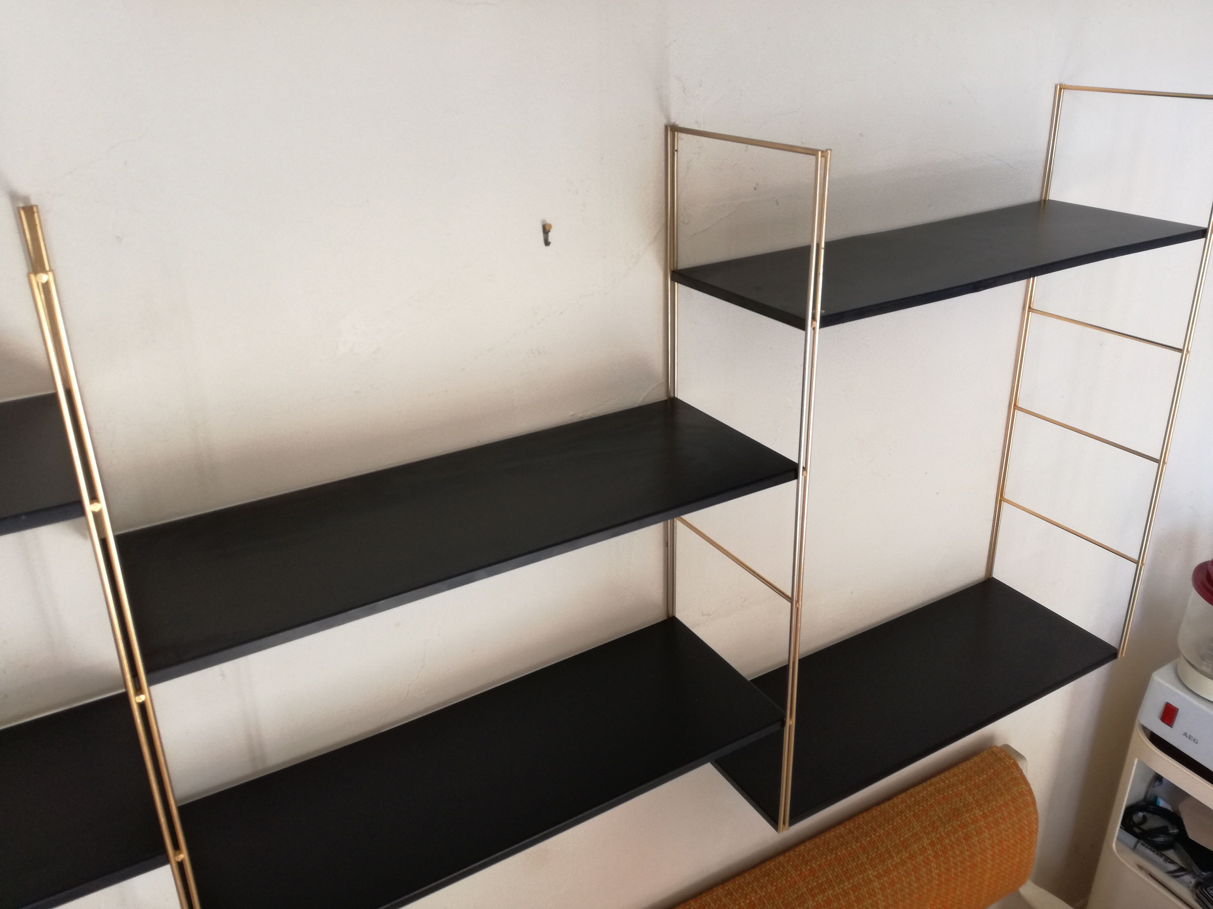 Gold and black thong shelf