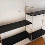 Gold and black thong shelf