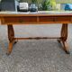 Victorian extendable coffee table in solid mahogany wood and green leather