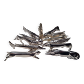 12 knife rests by marcel edouard sandoz for gallia.