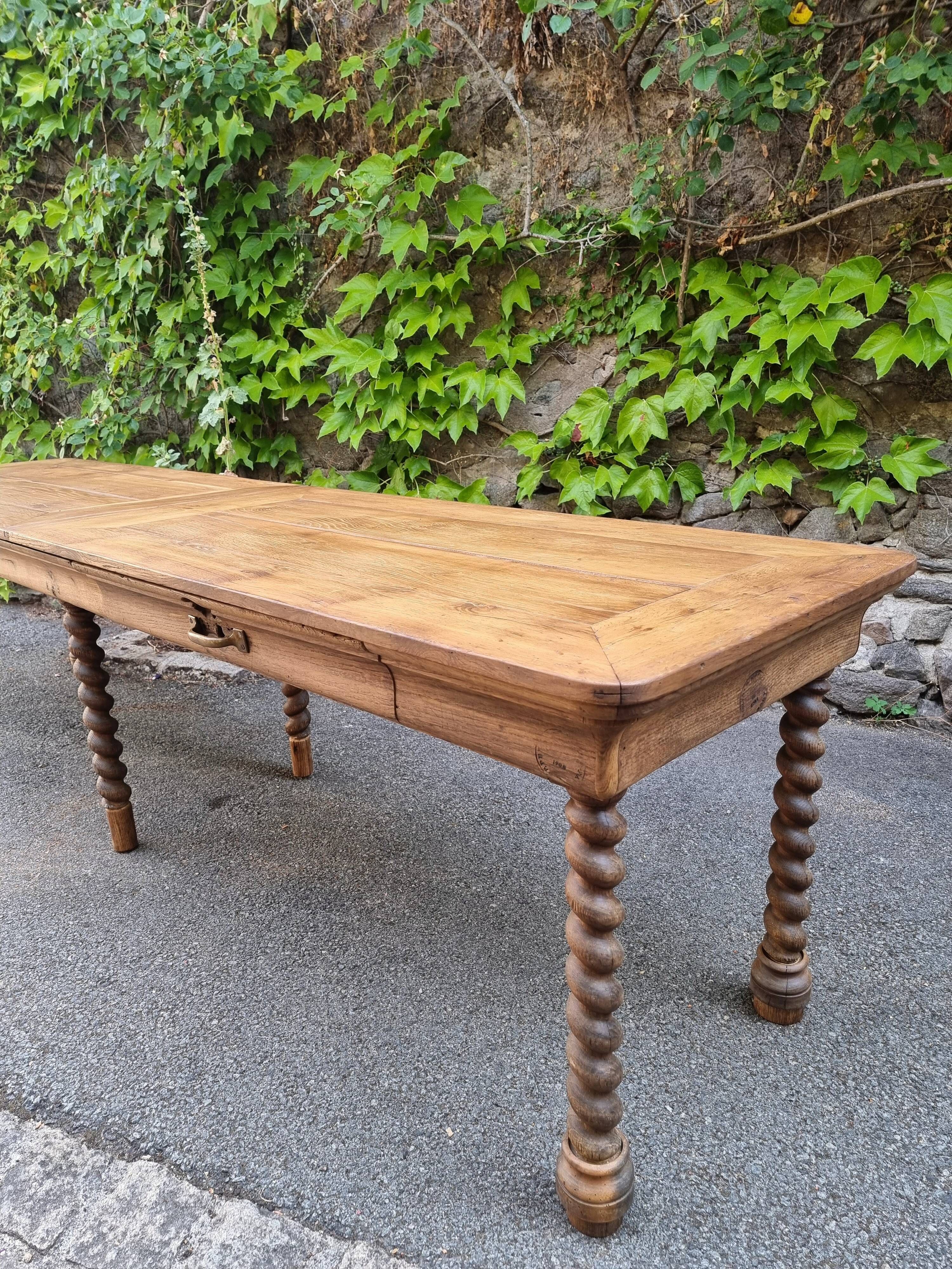 Antique French draper's table in oak, shop counter, work table, 6 feet, circa 1750–1850.