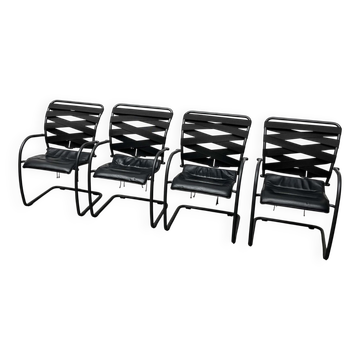 Italian postmodern cantilevered Canasta armchairs by Heron Parigi for Heron Parigi Design, 1980s, set of 4.