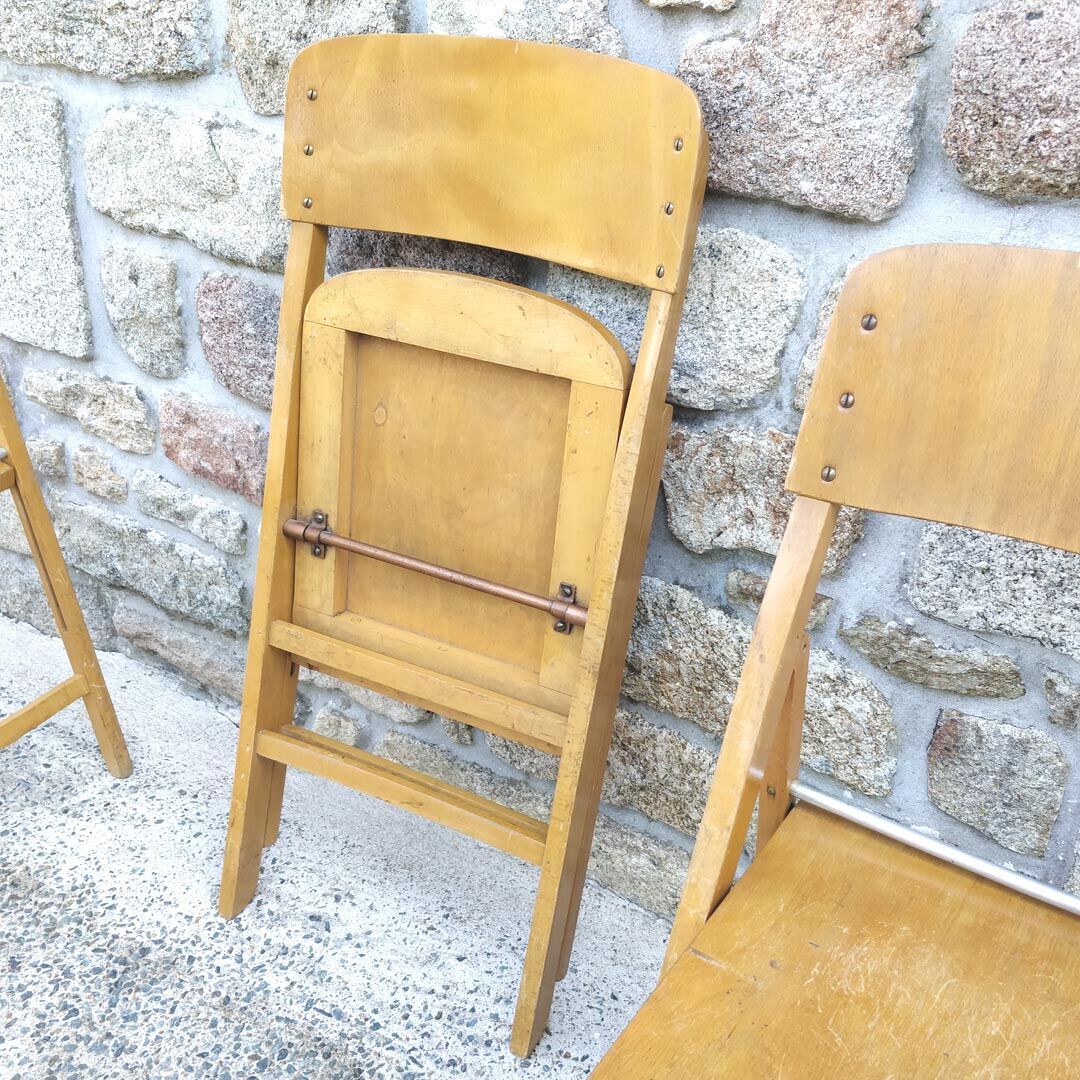 Four 60s wooden Stella chairs
