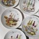 Porcelain cheese platter with 6 matching plates.