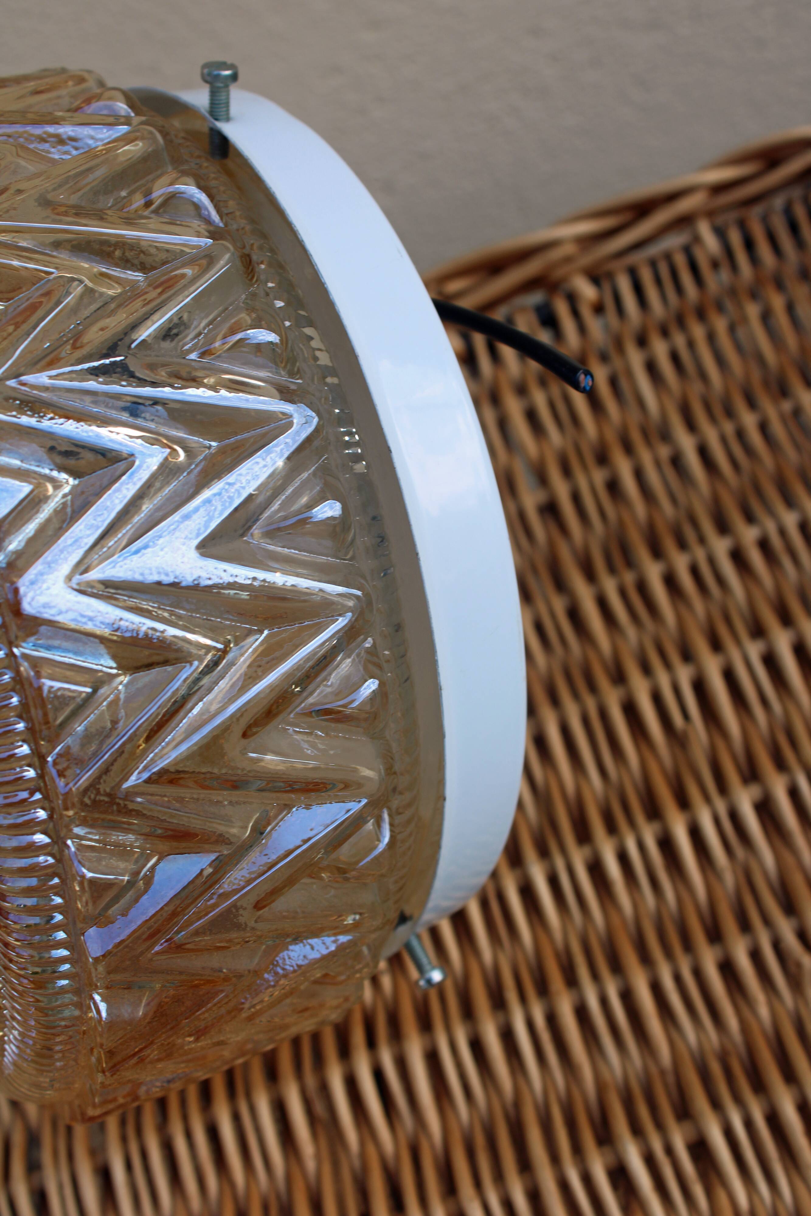 Amber moulded glass ceiling