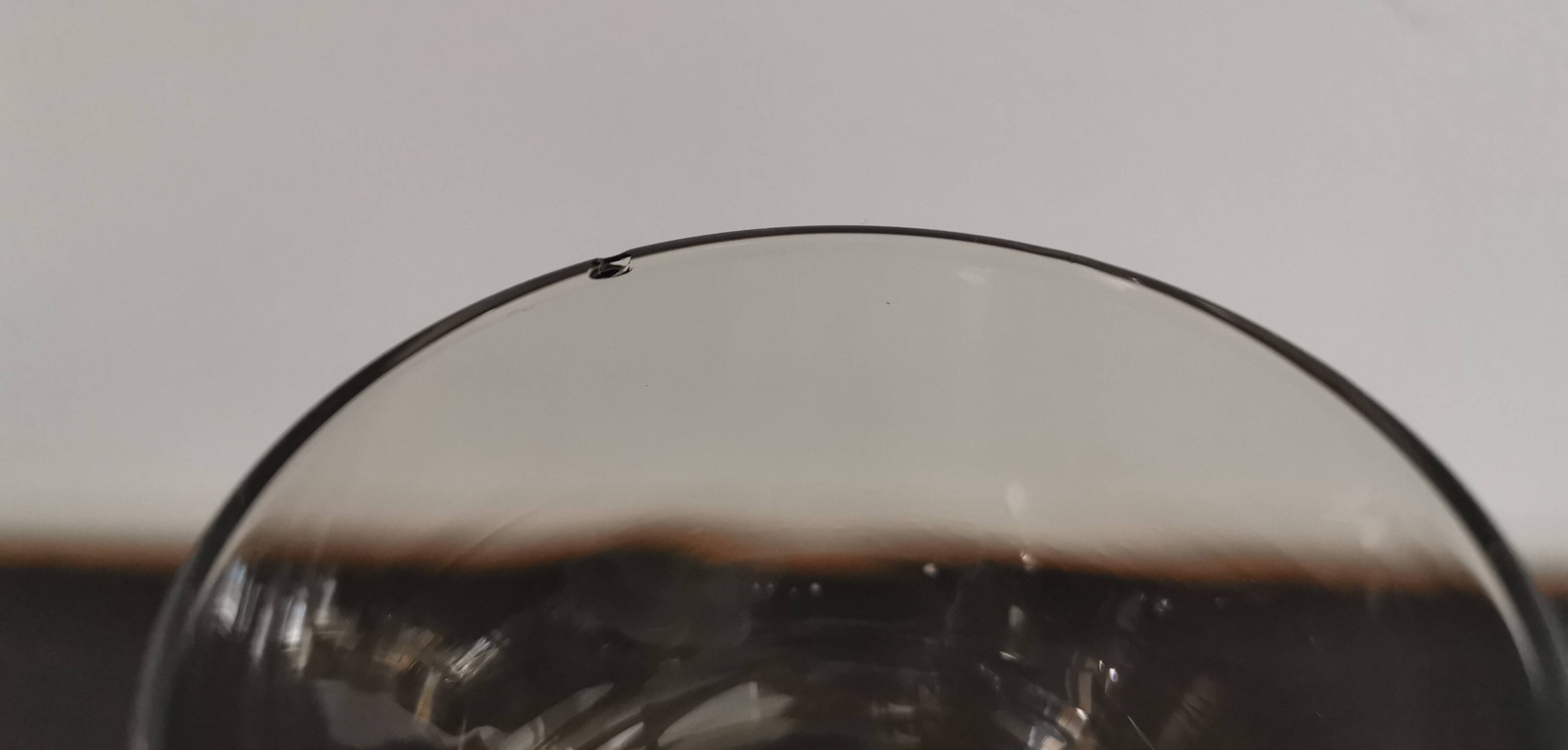 9 white wine glasses on vintage Luminarc smoked black stem