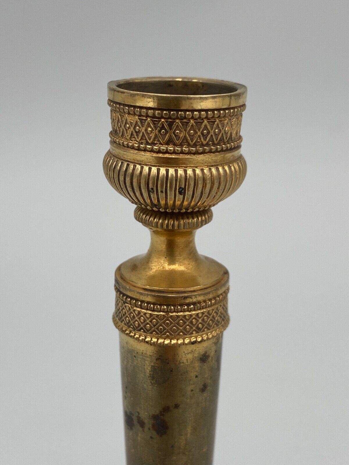 Pair of miniature candle holders in bronze dore restoration period nineteenth