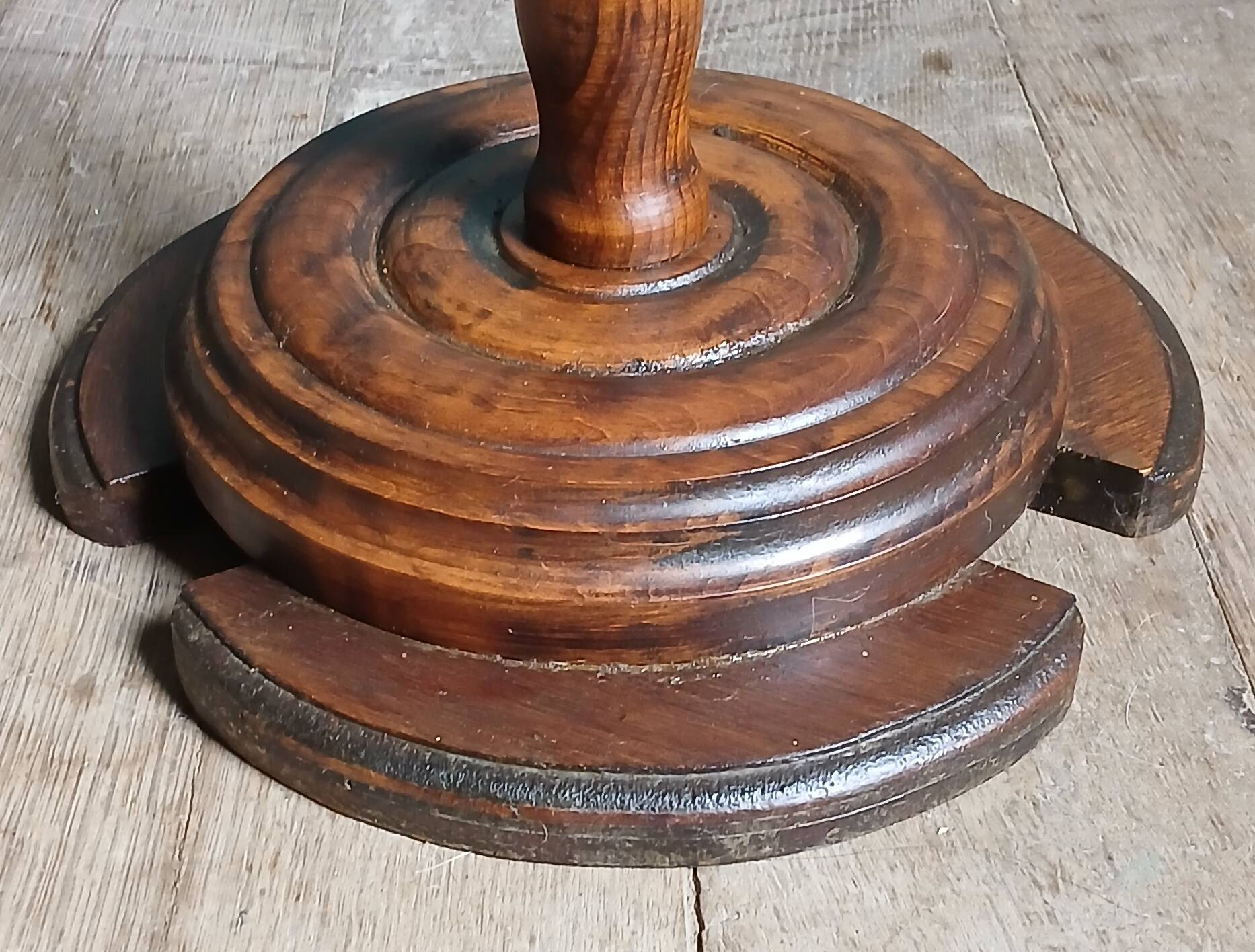 Turned solid wood side table stained with a quartz top.