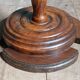 Turned solid wood side table stained with a quartz top.
