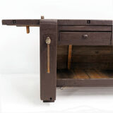Brown painted workbench with shelf and drawers