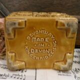 Devonway jam pot in the shape of a cottage with a thatched roof.