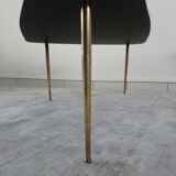 Tripod vintage black glass coffee table