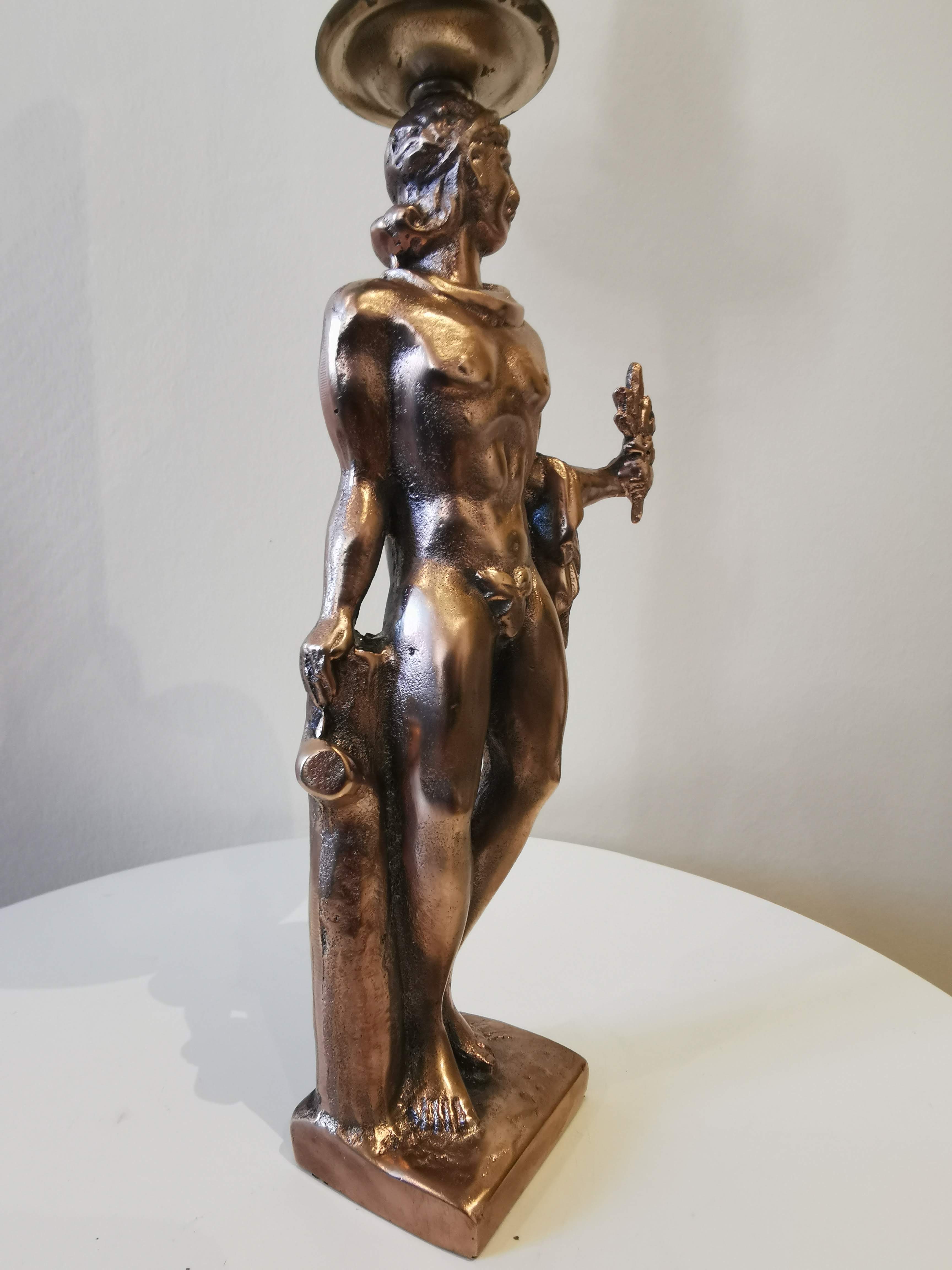 Large kerosene lamp mounted on bronze statue. Late nineteenth century
