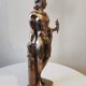 Large kerosene lamp mounted on bronze statue. Late nineteenth century