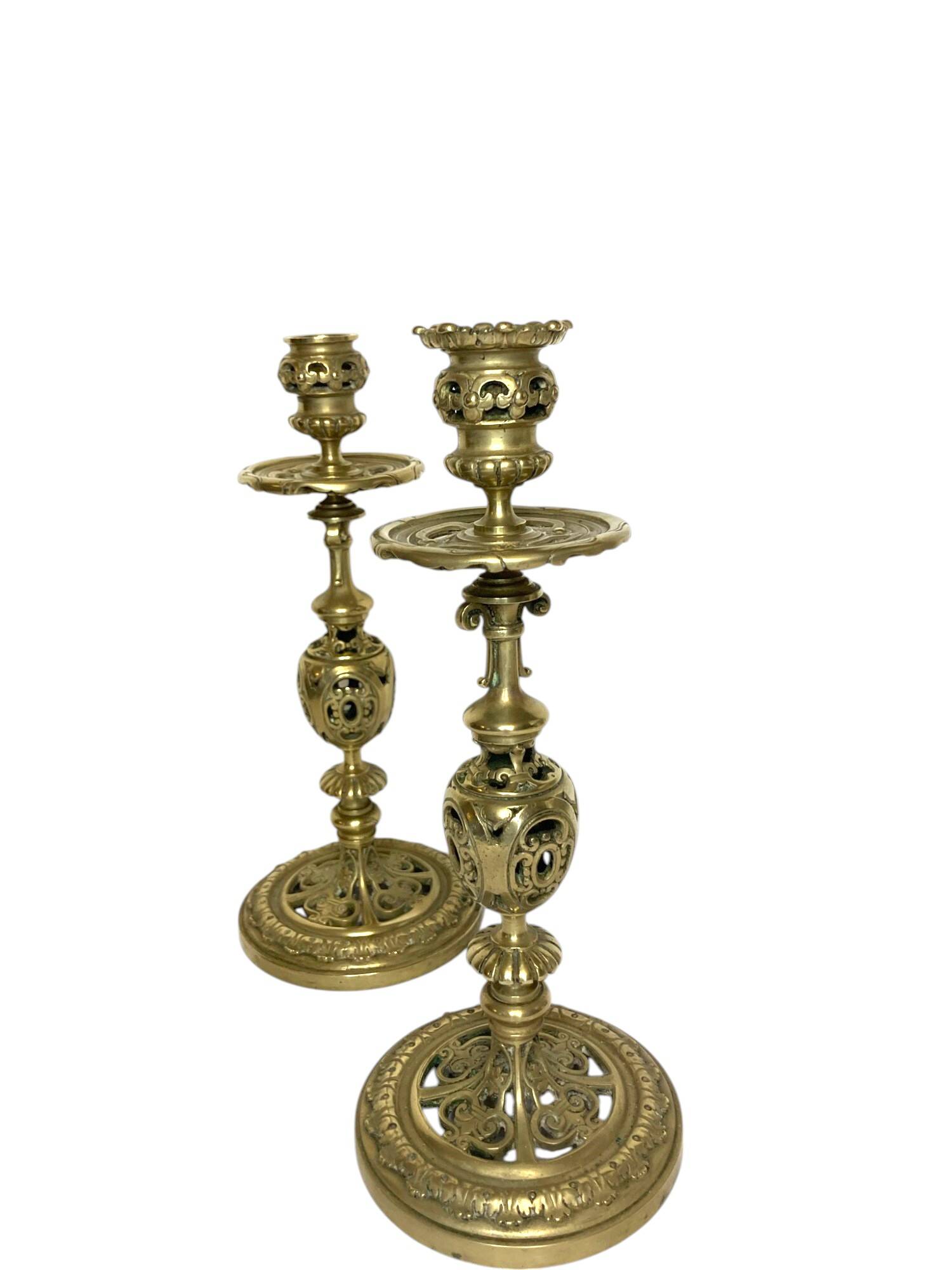 Pair of bronze torches chiseled with foliage, 19th century