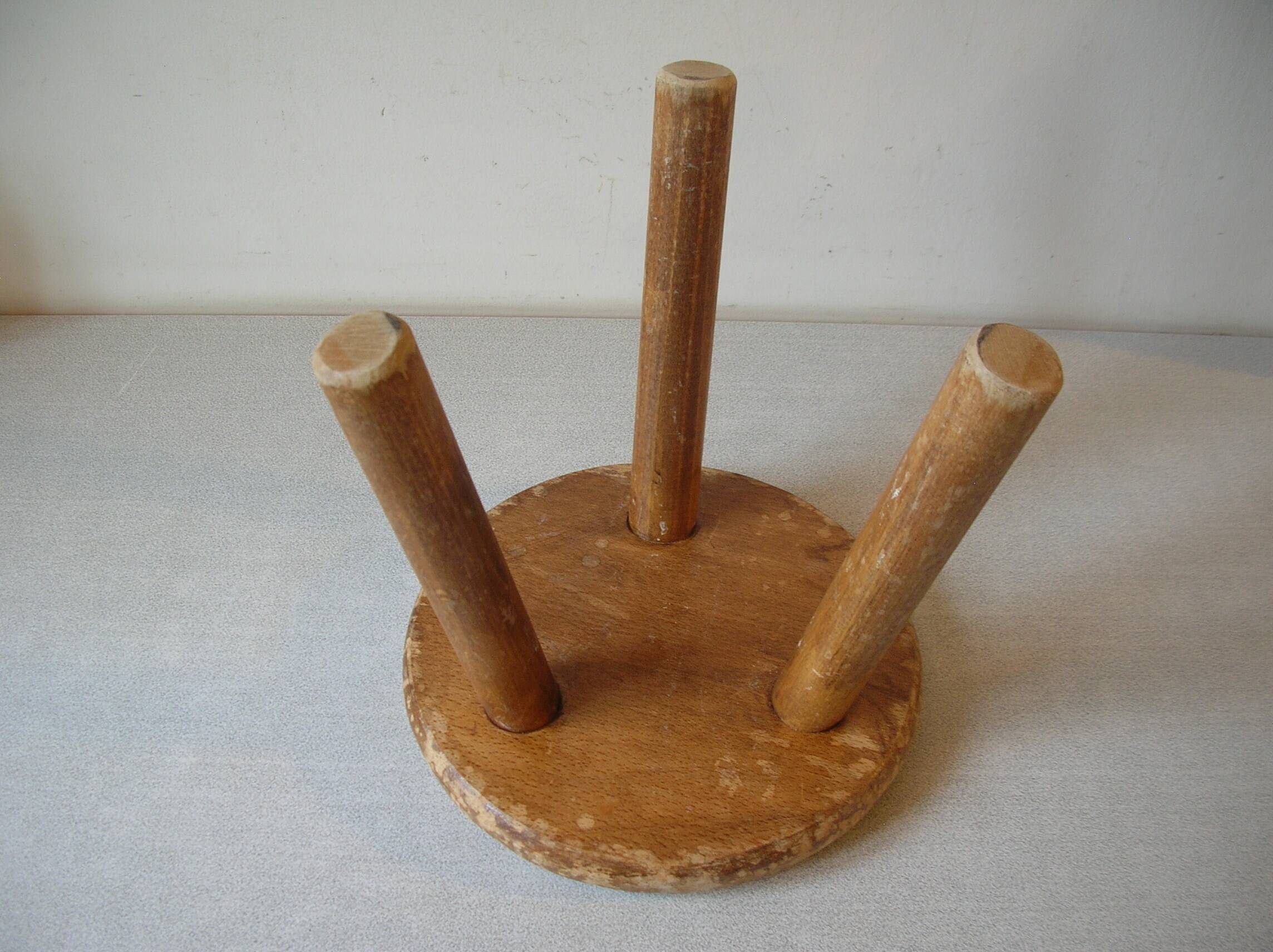 Old tripod stool with 3 wooden legs, painted floral decoration, flower bouquet