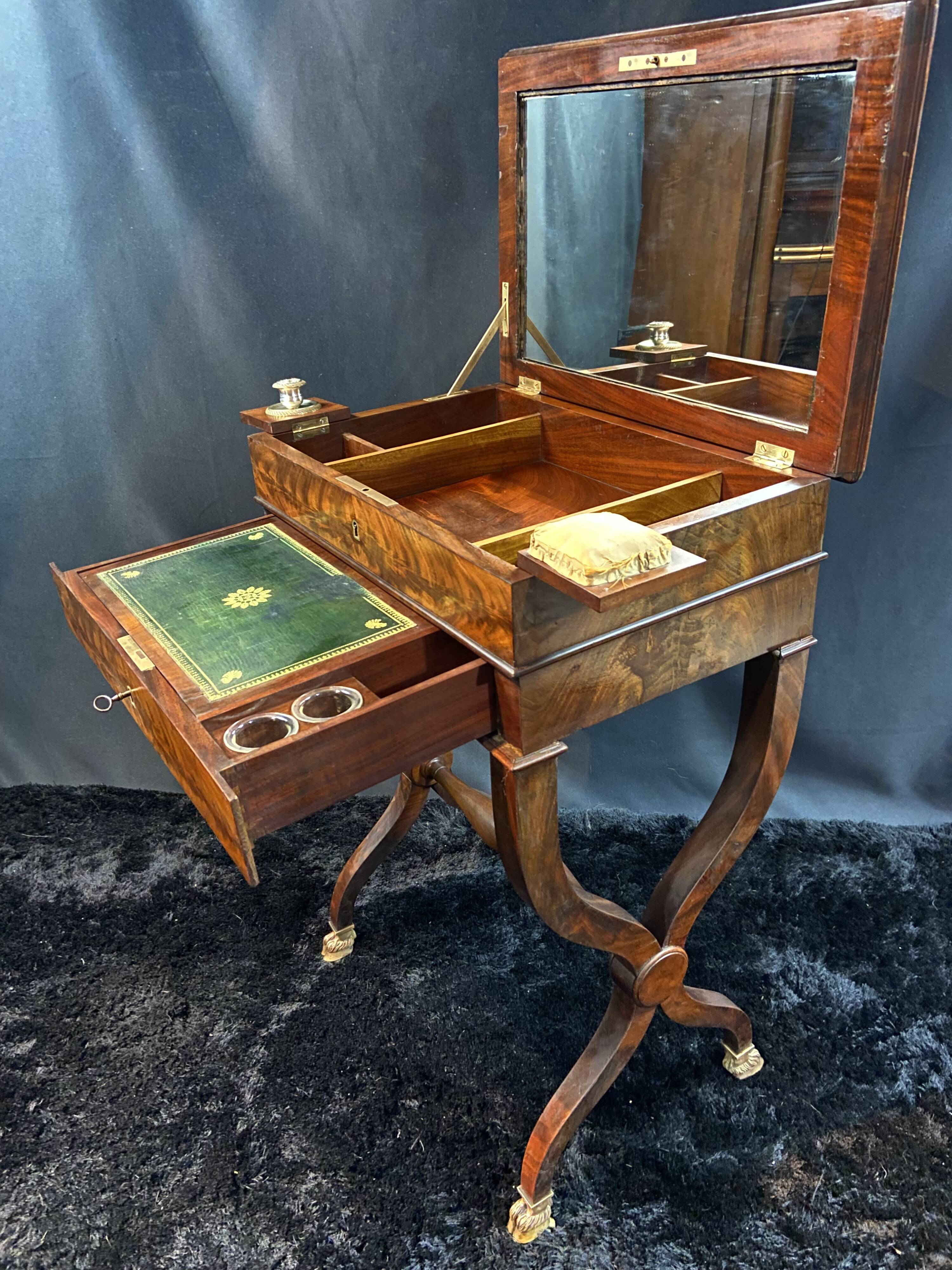 Louis-Philippe period mahogany writing desk with candlestick, 19th century