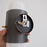 Set of four wall lights in white plexiglass and perforated black metal.