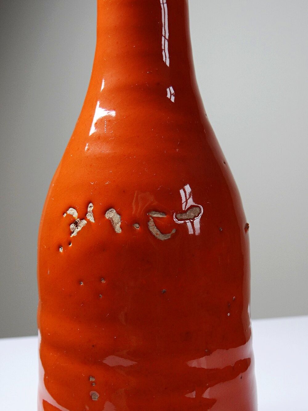 Bright orange mid-century decorative bottle lamp base glazed pottery.