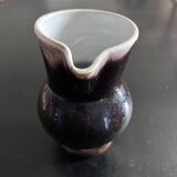 Antique tilted pitcher